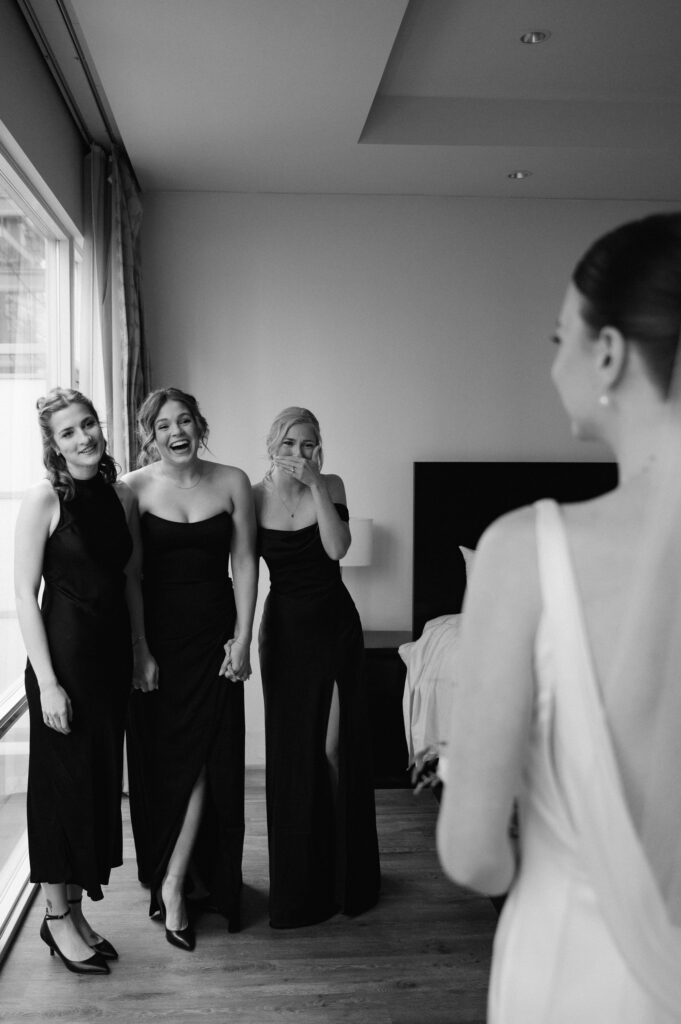 First look with bridesmaids in Vancouver