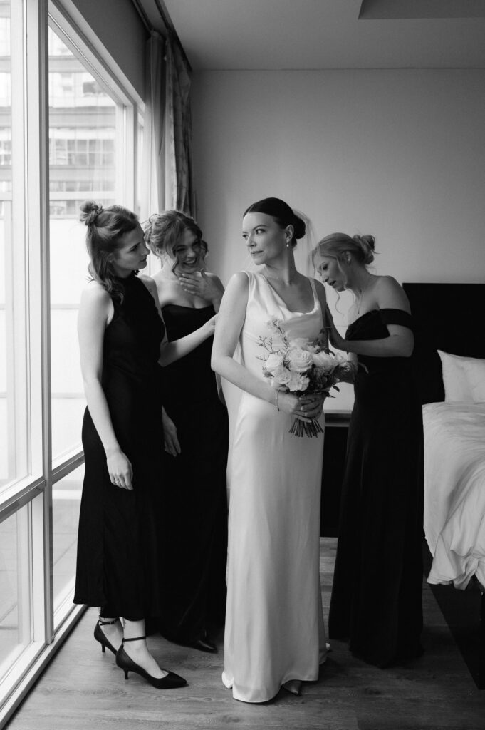 First look with bridesmaids in Vancouver